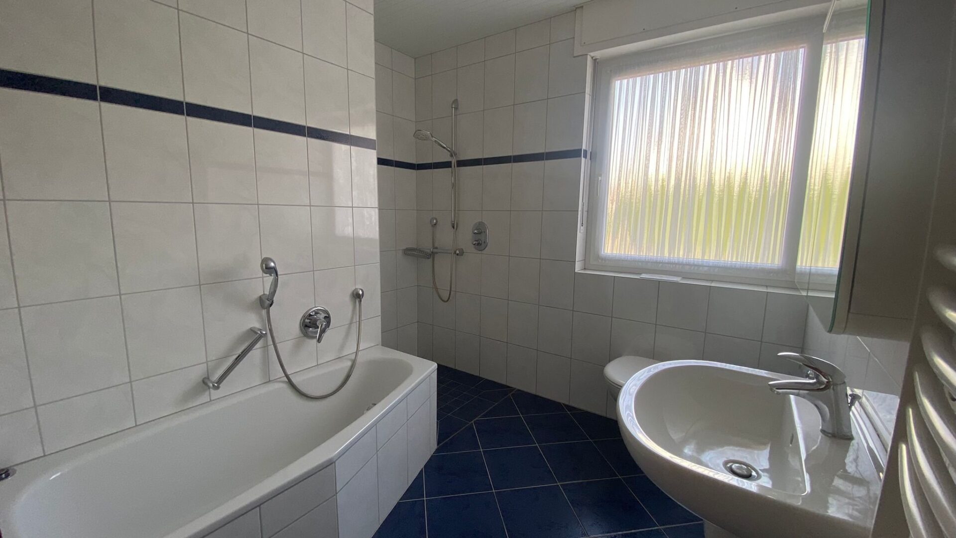 Gepflegte Erdgeschosswohnung mit Garten und Garage in attraktiver Lage von Warendorf