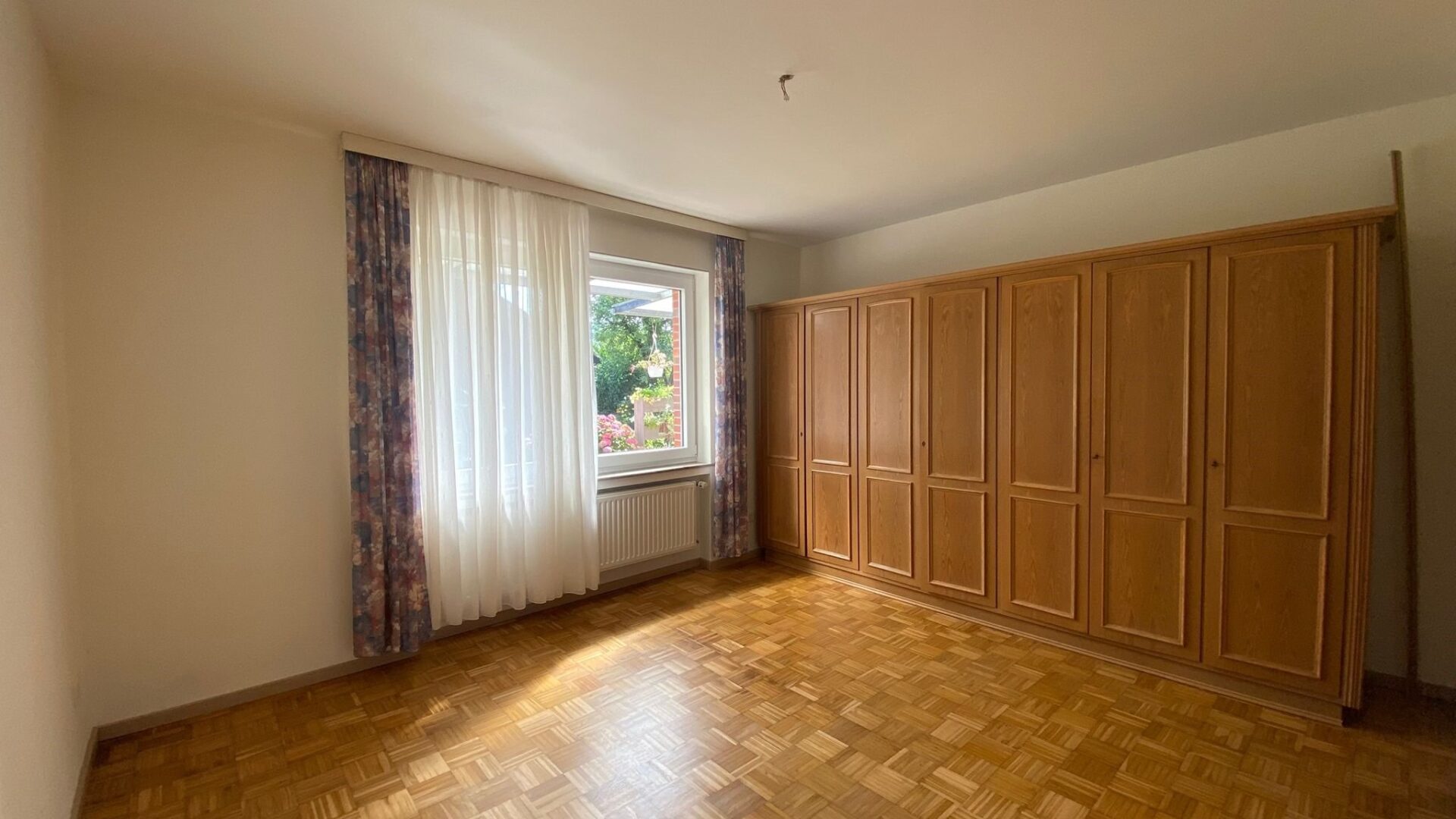 Gepflegte Erdgeschosswohnung mit Garten und Garage in attraktiver Lage von Warendorf